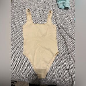 Butter yellow ribbed body suit
